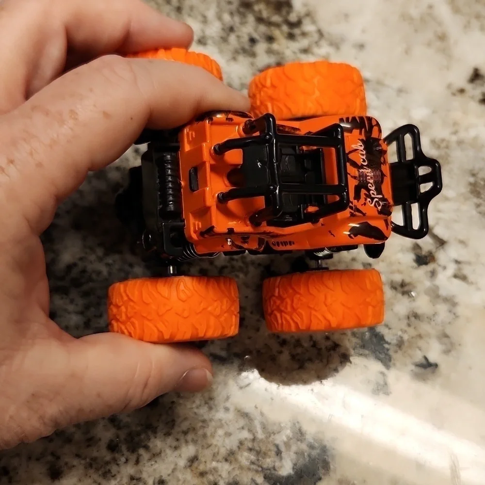 Jeep monster truck reve up car orange black